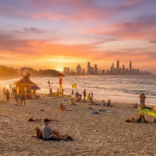 A gathering of locals on the sand; the 'Volunteer Cavalry' network aims for zero preventable deaths through community-first aid and rapid response.