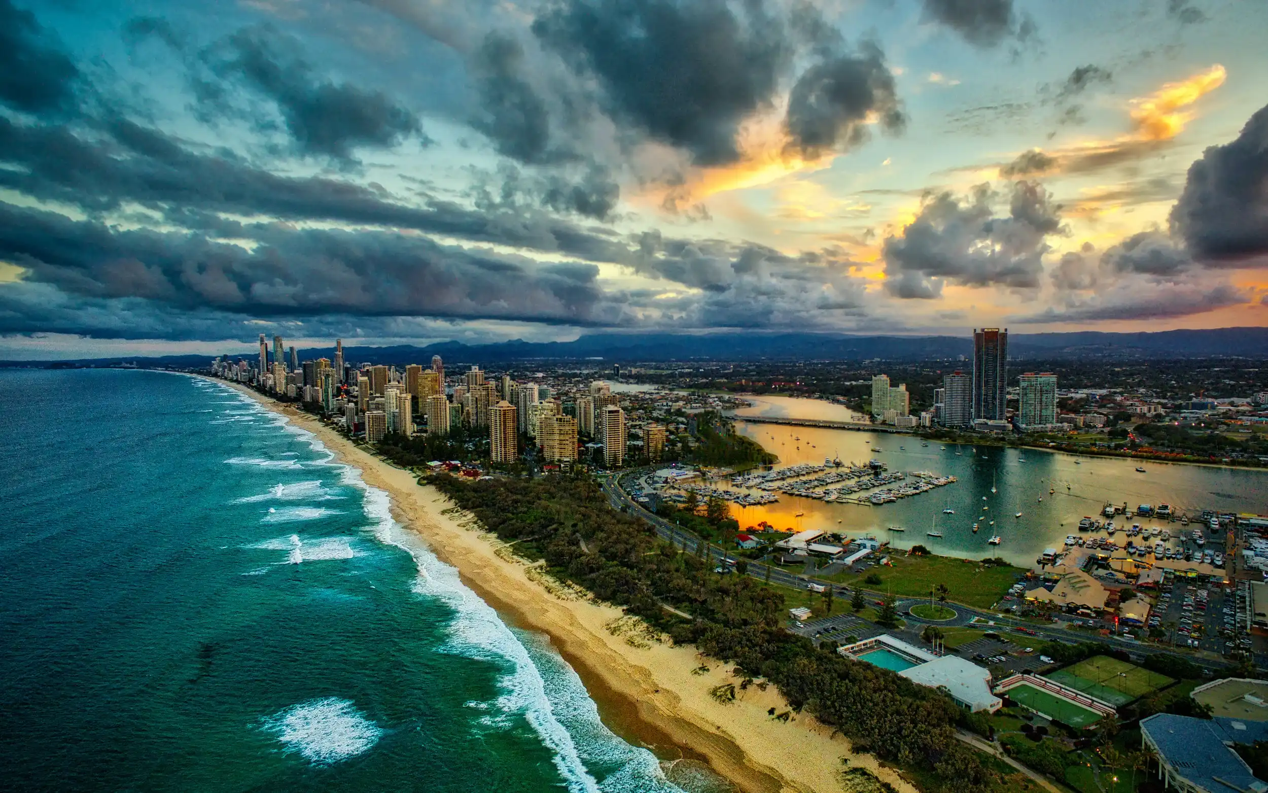 A wide view of the Gold Coast coastline, highlighting the geographic challenges and traffic bottlenecks that Sunny Link™ community responders overcome.