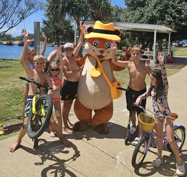 Sunny the Quokka on a mission; representing the real, messy, and big-hearted Gold Coast community rather than a perfect tourist brochure.